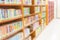 Blurry library bookshelves background. in school education learning concept