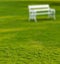 Blurry Long white bench in the park