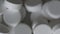 Blurry Macro Close-up of Rotating Pills, Pharmacy Background