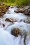 Blurry motions water of river. River along the Aurlandsfjellet mountains in Norway