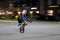 A Blurry Photograph of a Person Riding a Dirt Bike in Baltimore City