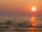 Blurry scence of sunset with the ocean`s wave