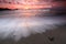 Blurry sunset on the beach with Inspirational quote - A dream you dream alone is only a dream , A dream you dream together is real