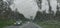 Blurry view of countryside road bad weather.