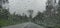 Blurry view of countryside road bad weather.