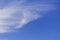 Blye sky with white fluffy clouds background