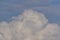 Blye sky with white fluffy clouds background