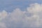 Blye sky with white fluffy clouds background