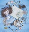 Blythe doll dressed up as Alice in Wonderland concept. Flatlay of Wonderland with fairy tale story book,