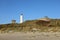 BLÃ¥VAND, DENMARK - Nov 08, 2020: Bunkers and lighthouse at Blaavandshuk