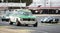 BMW 2002 chased by a Porsche 911 and a Ford GT40 in a classic car race at the Jarama circuit