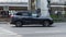 BMW X5 G05 car on the city road. Fast moving black auto on Moscow streets. Accelerating with low-emission. Compliance with speed