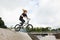 BMX rider over ramp