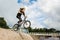 BMX rider over ramp