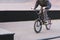 Bmx rider rides along the park skate