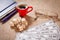 Board game lotto on sackcloth. Wooden lotto barrels and game cards with cup of coffee, notebook and glasses