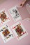 Board game, playing cards collection on pink background