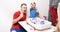 Board games: father and son play table hockey and cheer cheerfully