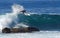 Board surfer riding in a wave at Laguna Beach, CA.