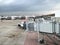 Boarding Bridge on the tarmac of an airport. Jet aircraft docked at the gate.