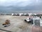 Boarding Bridge on the tarmac of an airport. Jet aircraft docked at the gate.