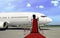 Boarding commercial airplane with red carpet presentation