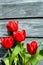 Boards brighten by red tulips