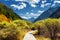 Boardwalk across autumn forest among scenic wooded mountains