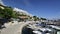 The boardwalk in the harbor at Brela. The Makarska riviera in Croatia is famous for its beautiful pebbly beaches and crystal clear