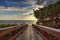 Boardwalk leads down to the white sand of Barefoot Beach