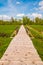 Boardwalk nature experience trail cross marsh, Seekirchen am Wallersee, Austria.