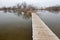 Boardwalk pathway over lake and swamp