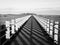 Boardwalk, perspective with vanishing point leading lines and shadow pattern