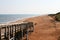 Boardwalk on the red sands- beach,Canada