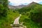 Boardwalk on Svagae river loop hike trail with mountains in the background. Denali Detional Park and Preserve, Alaska