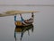 A boat on Amarapura lake at Ubein bridge