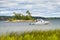 Boat anchored on lake