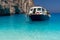 Boat anchored on Navagio beach (also known as shipwreck beach),