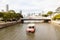 Boat Approaching Anderson Bridge on Singapore River