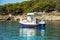 Boat in the bay in Assos village, Kefalonia island, Greece.