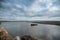 Boat on a beach in Barranquilla on a cloudy day