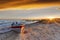 Boat on Beach at Sunrise Over Buffalo Lake, Alberta