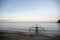 boat on a beach at sunset in Asia