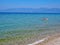 Boat in the beautiful blue waters of the Corinthian Gulf near Aigio, Greece