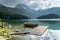 Boat on Black Lake in the national park Durmitor and mountains i