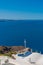 Boat on a building at Oia with traditional white houses, Santorini island, Greece