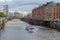 Boat in a canal with bridge in Speicherstadt hamburg