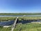 A boat on a canal at De Alde Feanen National Park