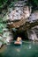 Boat cave tour in Trang An Scenic Landscape formed by karst towers and plants along the river (UNESCO World Heritage Site). It\'s