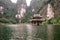 Boat cave tour in Trang An Scenic Landscape formed by karst towers and plants along the river (UNESCO World Heritage Site). It\'s